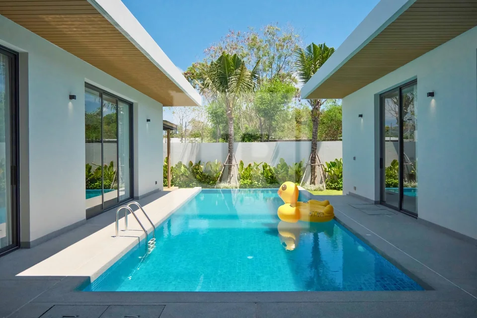 Slow Island Days Begin at This 4-Bedroom Pool Villa, property photo
